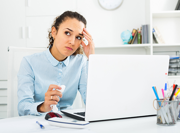 Frustrated Woman at Computer