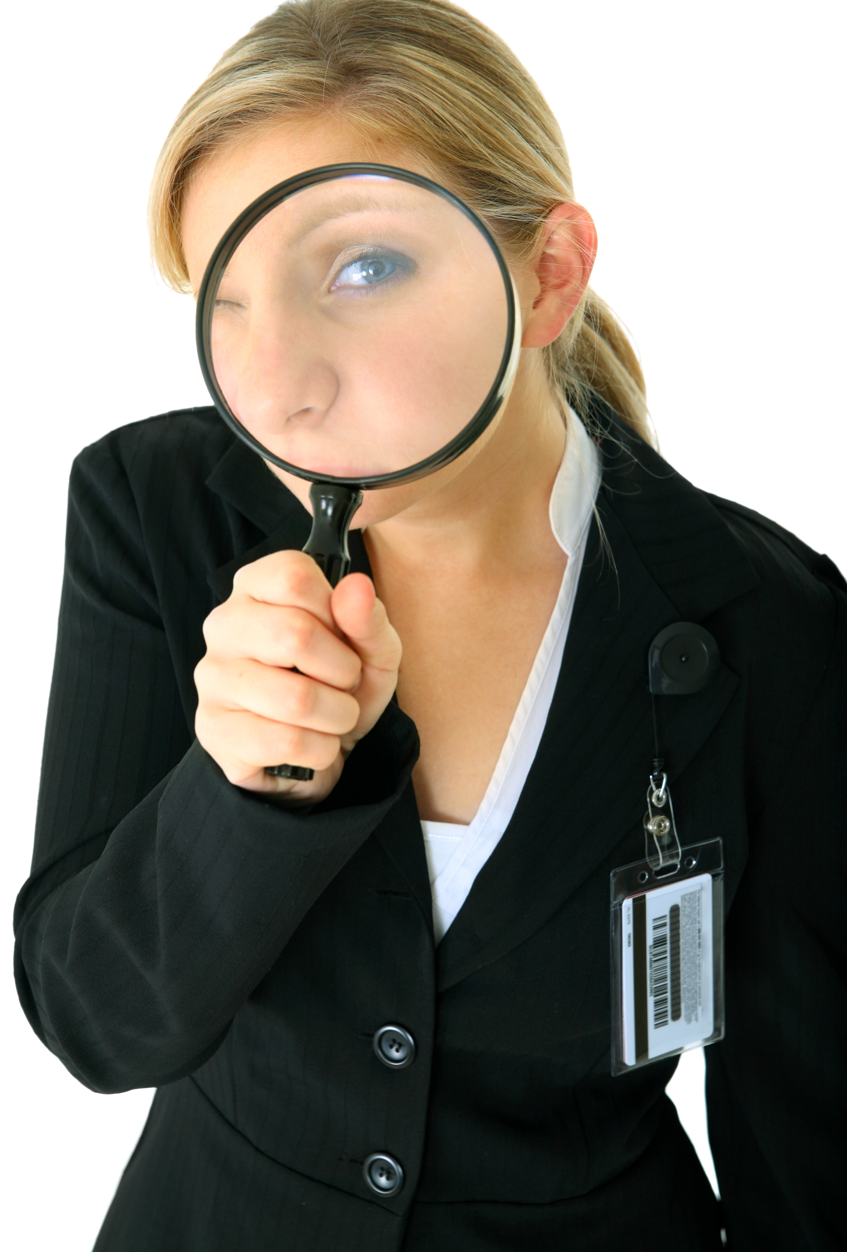 shutterstock_29040337 - business woman looking magnifying glass